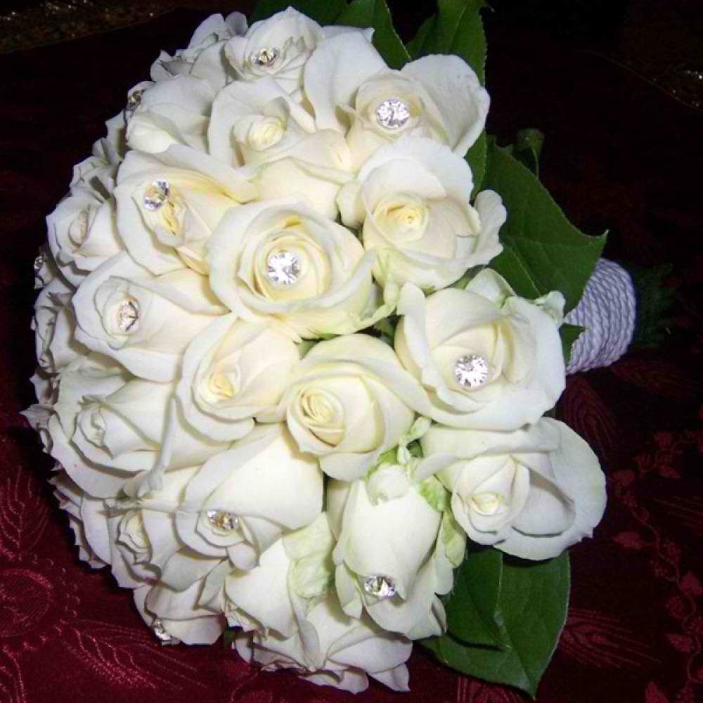 White Roses & Swarovski - Bridal bouquet of white roses with swarovski in their center and salal foliage!